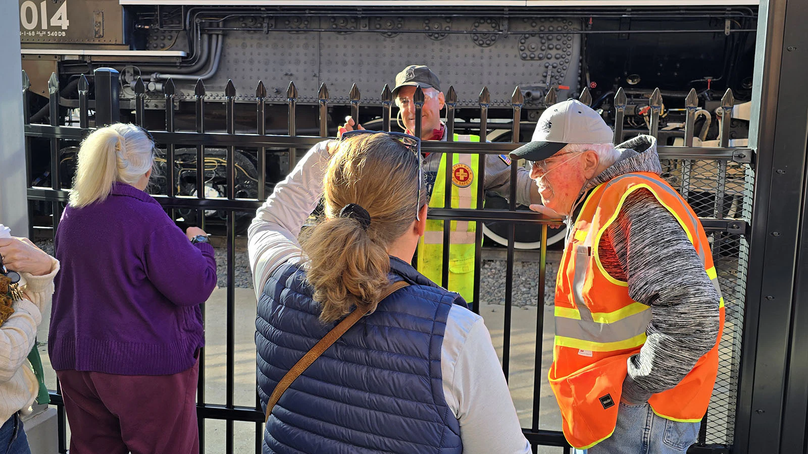 Union Pacific Heritage Operations Manager Ed Dickens visits with people about Big Boy ahead of its departure from Cheyenne.