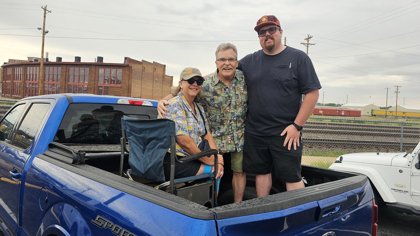 Barb Egeland, Mark Egeland and Alex Egeland drove from Colorado for a mini-tailgate party as they waited for Big Boy to return. They had pretzels to munch on and sodas to drink while they waited.