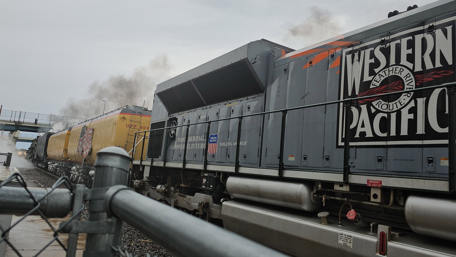 Big Boy takes off with a roar of sound and a huge trail of steam blowing to the sky.