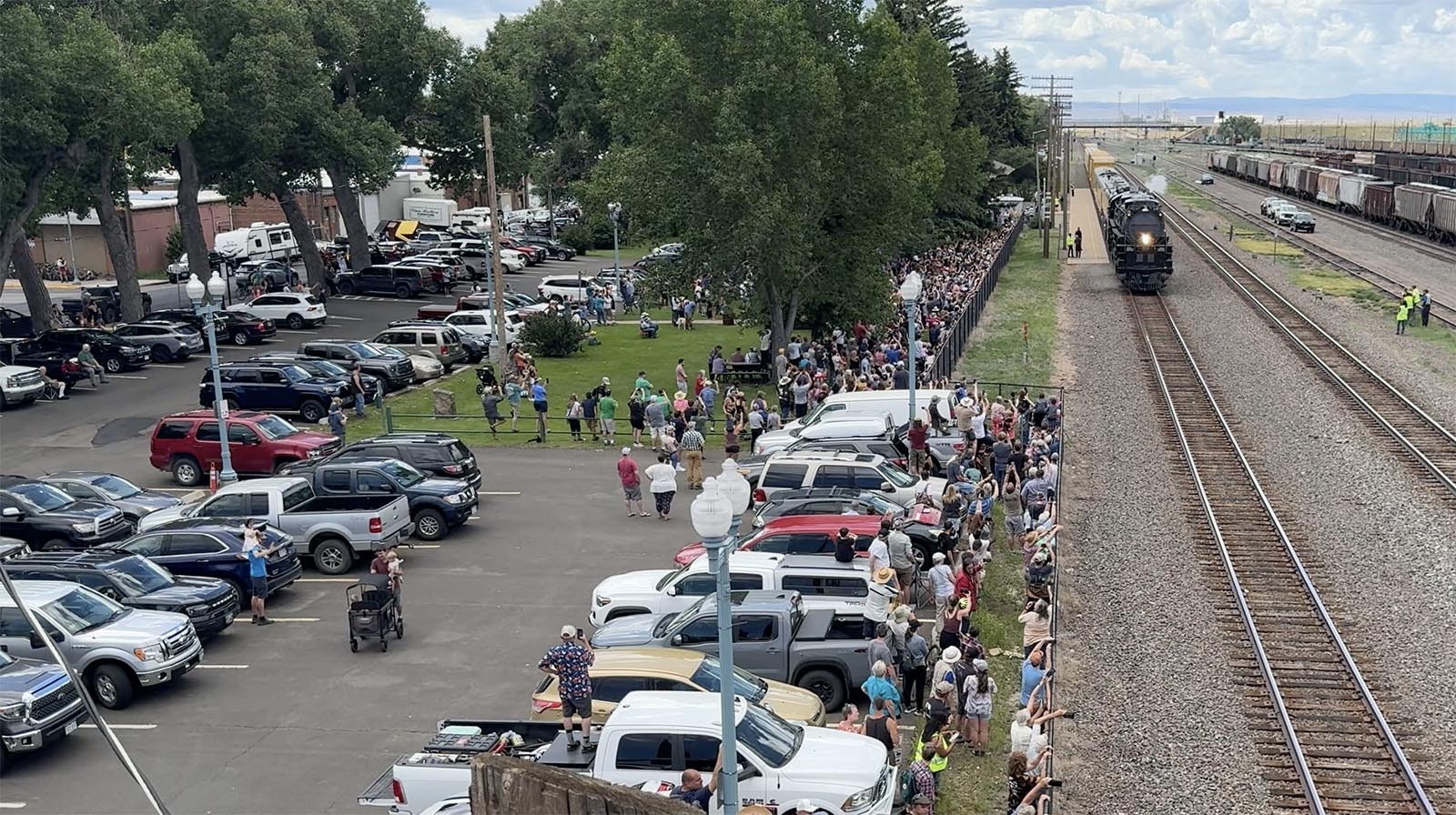 Big Boy 4014 makes the first stop on its 2024 summer tour in Laramie, Wyoming, on Sunday morning, June 30, 2024. Hundreds of curious people and serious train buffs waited for more than two hours to get a good viewing spot.,