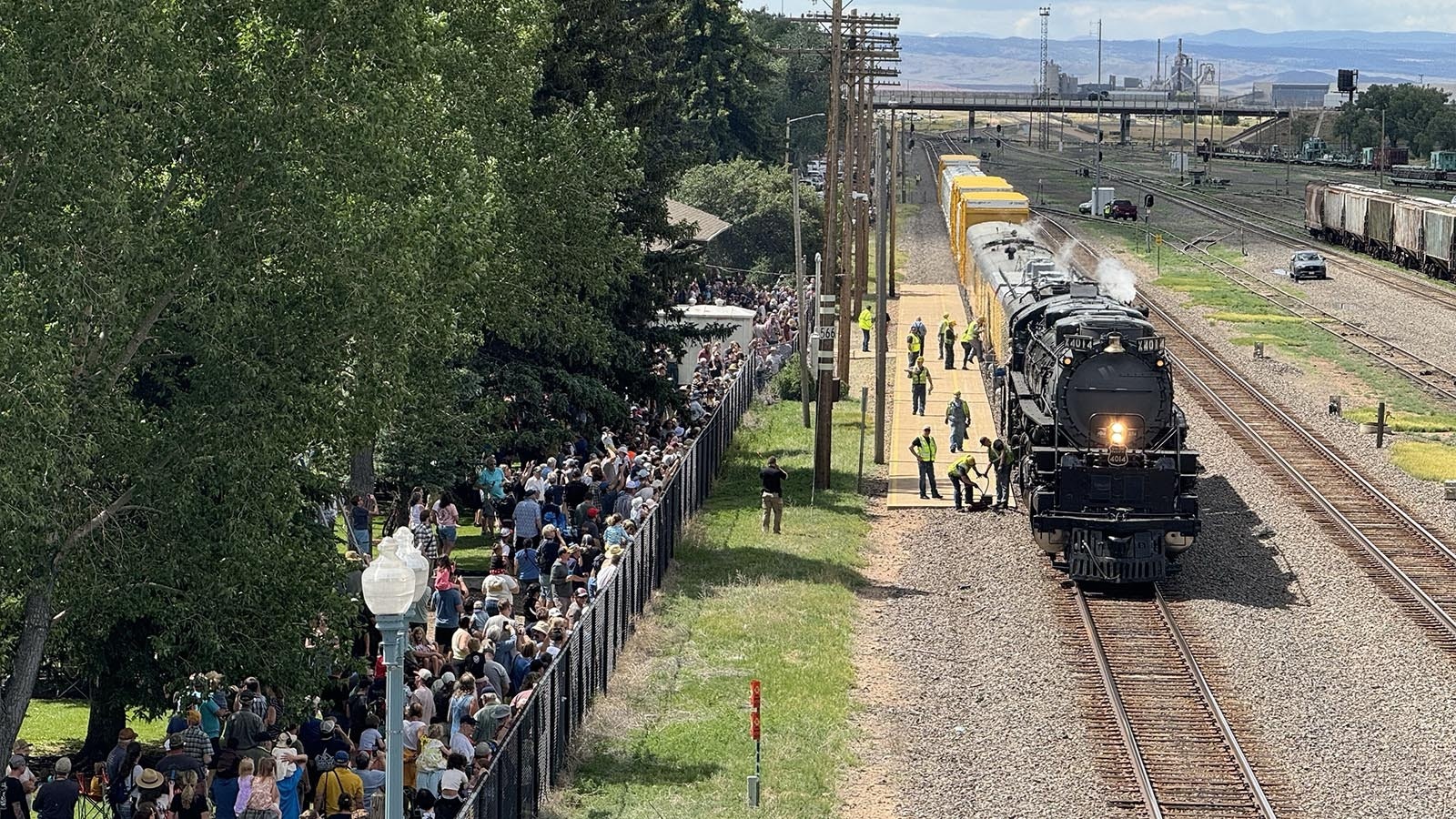 Big Boy 4014 makes the first stop on its 2024 summer tour in Laramie, Wyoming, on Sunday morning, June 30, 2024. Hundreds of curious people and serious train buffs waited for more than two hours to get a good viewing spot.,