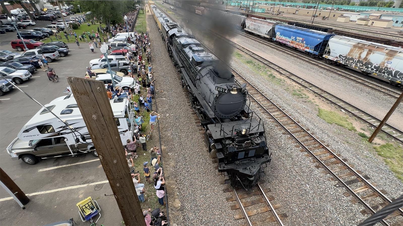 Big Boy 4014 makes the first stop on its 2024 summer tour in Laramie, Wyoming, on Sunday morning, June 30, 2024. Hundreds of curious people and serious train buffs waited for more than two hours to get a good viewing spot.,