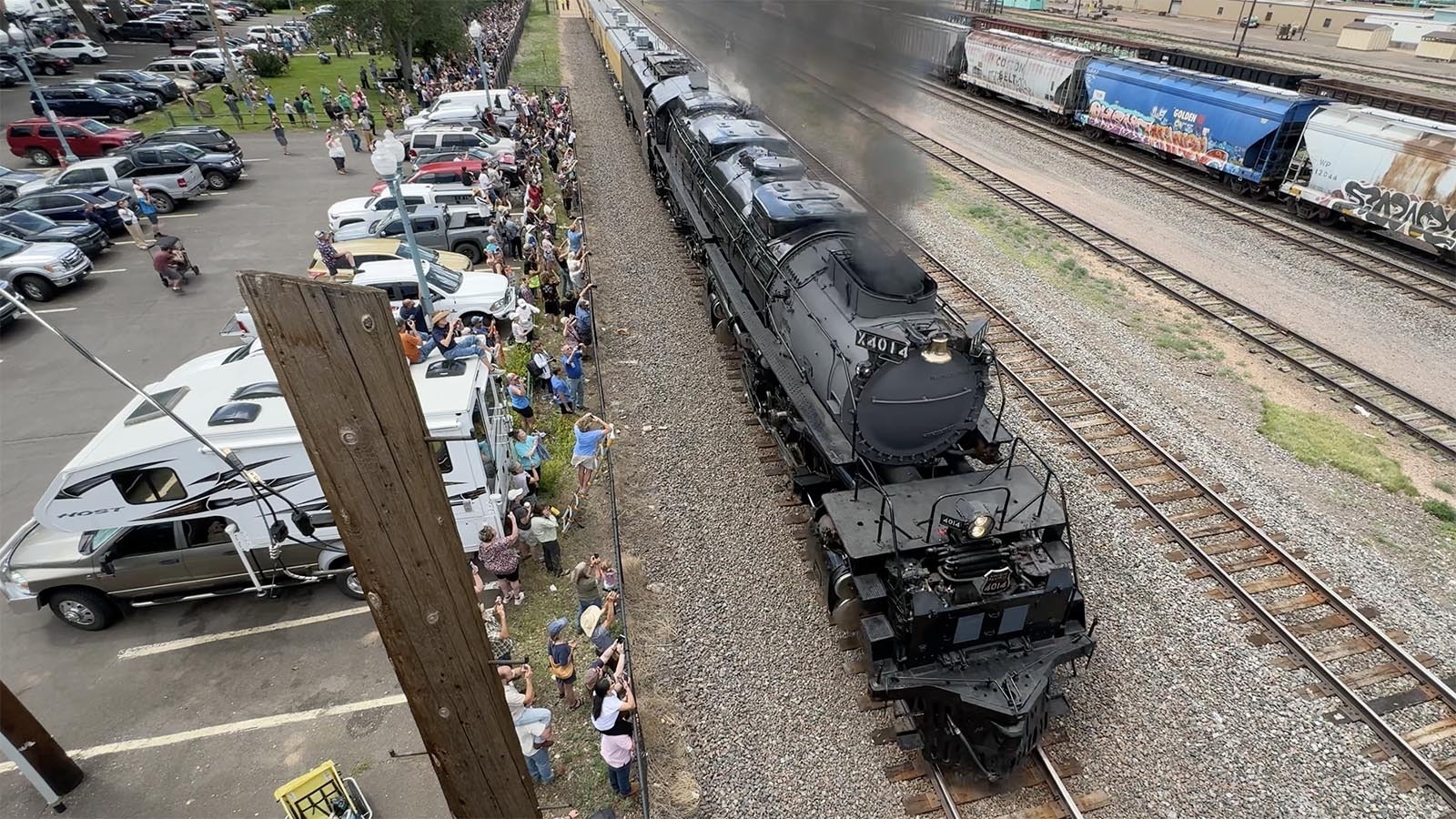 Big Boy 4014 makes the first stop on its 2024 summer tour in Laramie, Wyoming, on Sunday morning, June 30, 2024. Hundreds of curious people and serious train buffs waited for more than two hours to get a good viewing spot.,