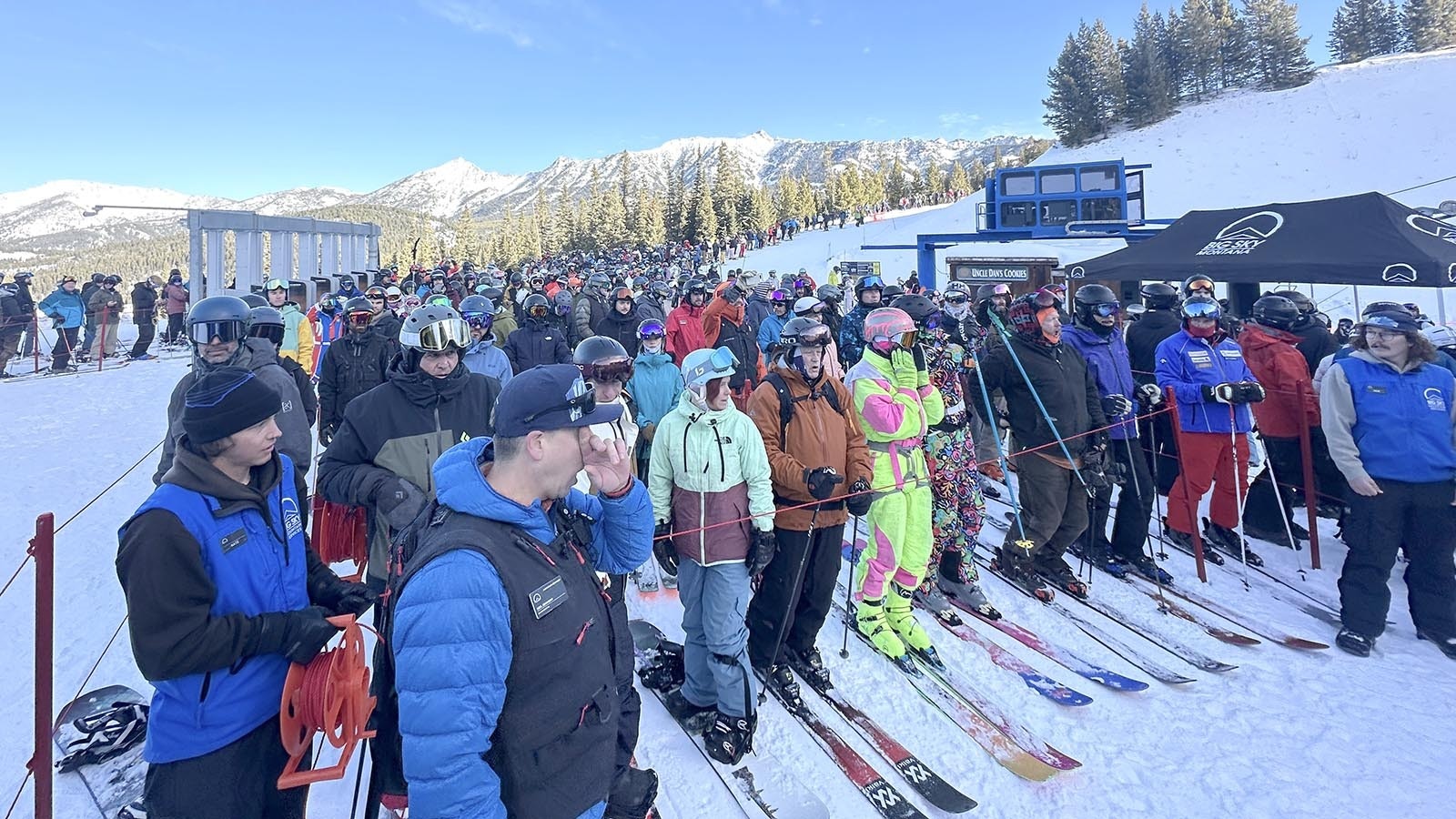 A crowd gathers for inaugural rides on Big Sky Resort’s new Madison 8 chairlift.