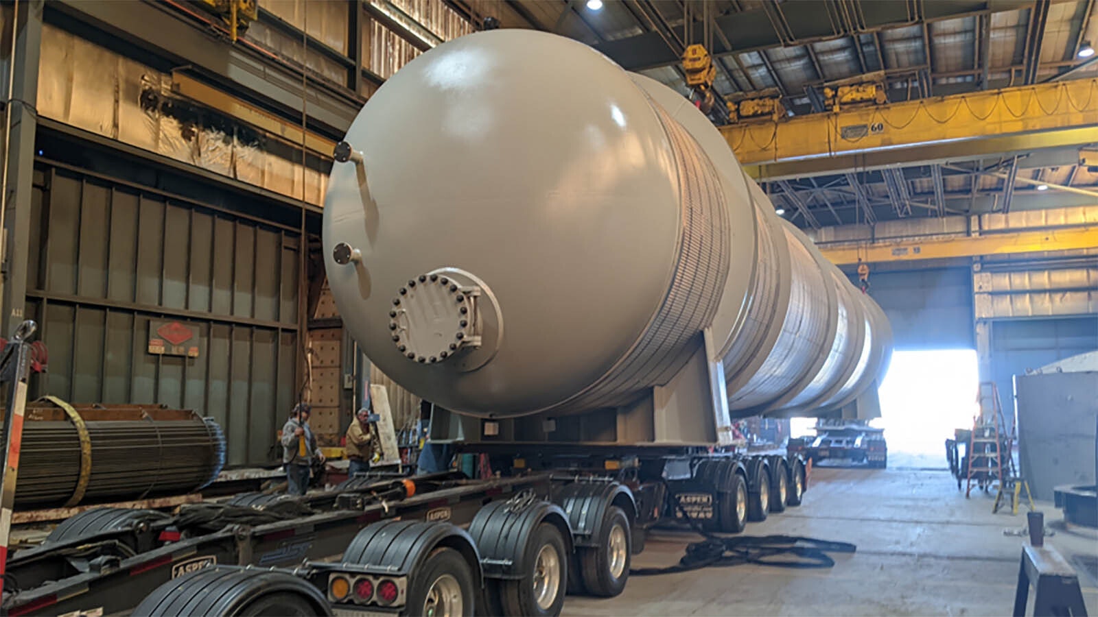 A big vessel destined for a carbon capture facility is readied to be trucked out of the plant.
