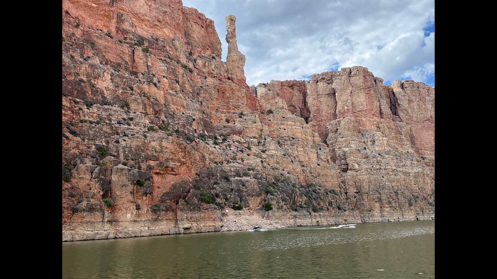 There are unique rock formations like this chimney rock along the canyon walls.