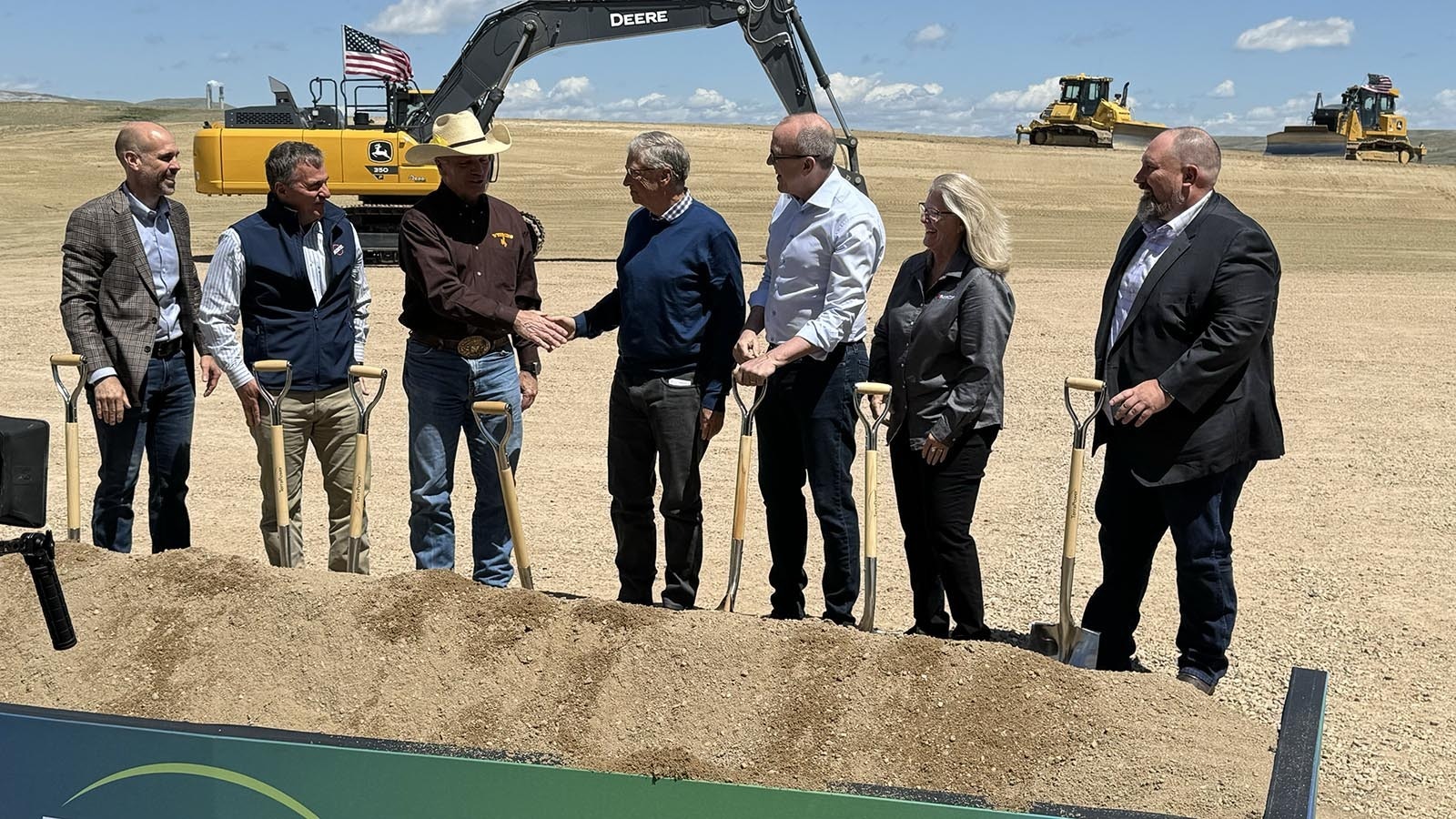 Wyoming Gov. Mark Gordon and billionaire Bill Gates shake hands at a groundbreaking ceremony for TerraPower’s nuclear reactor project in Kemmerer, Wyoming.