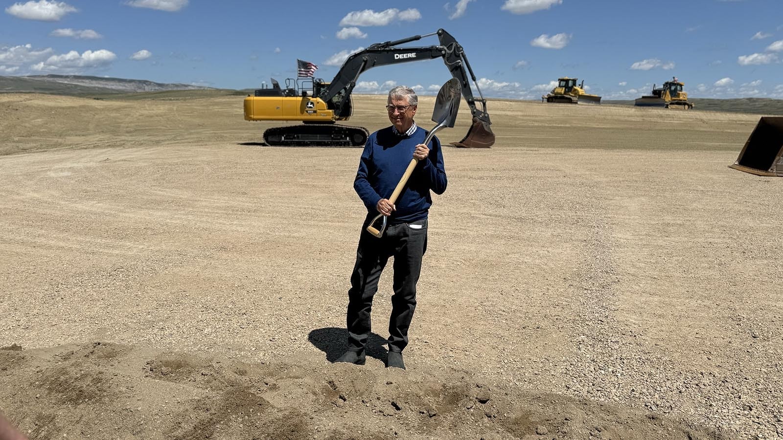Billionaire Bill Gates shows off a shovel he used to dig up dirt in a groundbreaking ceremony for TerraPower’s nuclear reactor project in Kemmerer, Wyoming.
