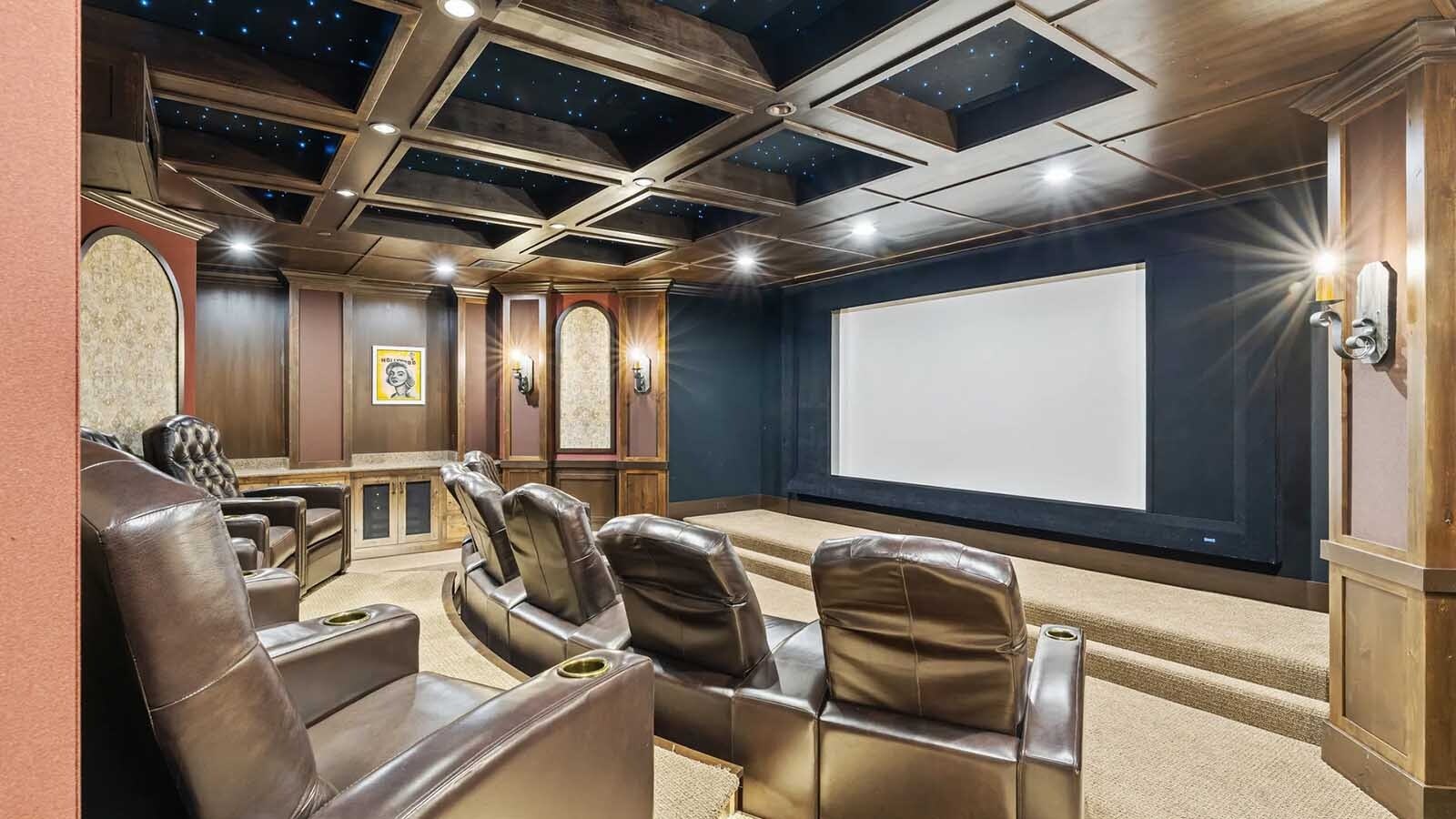 The property at 5650 Canyonwoods Drive in Billings, Montana, is described as a 30,843-square-foot stone chateau with 10 bedrooms and 19 bathrooms, situated on 98 acres. The listing mentions it's priced at $26.9 million and includes amenities like three pools, a 14-car garage, elevators, indoor shooting range, bowling alley, an outdoor 3-hole golf course and an indoor golf simulator, plus a wine cellar, workout gym and theater.