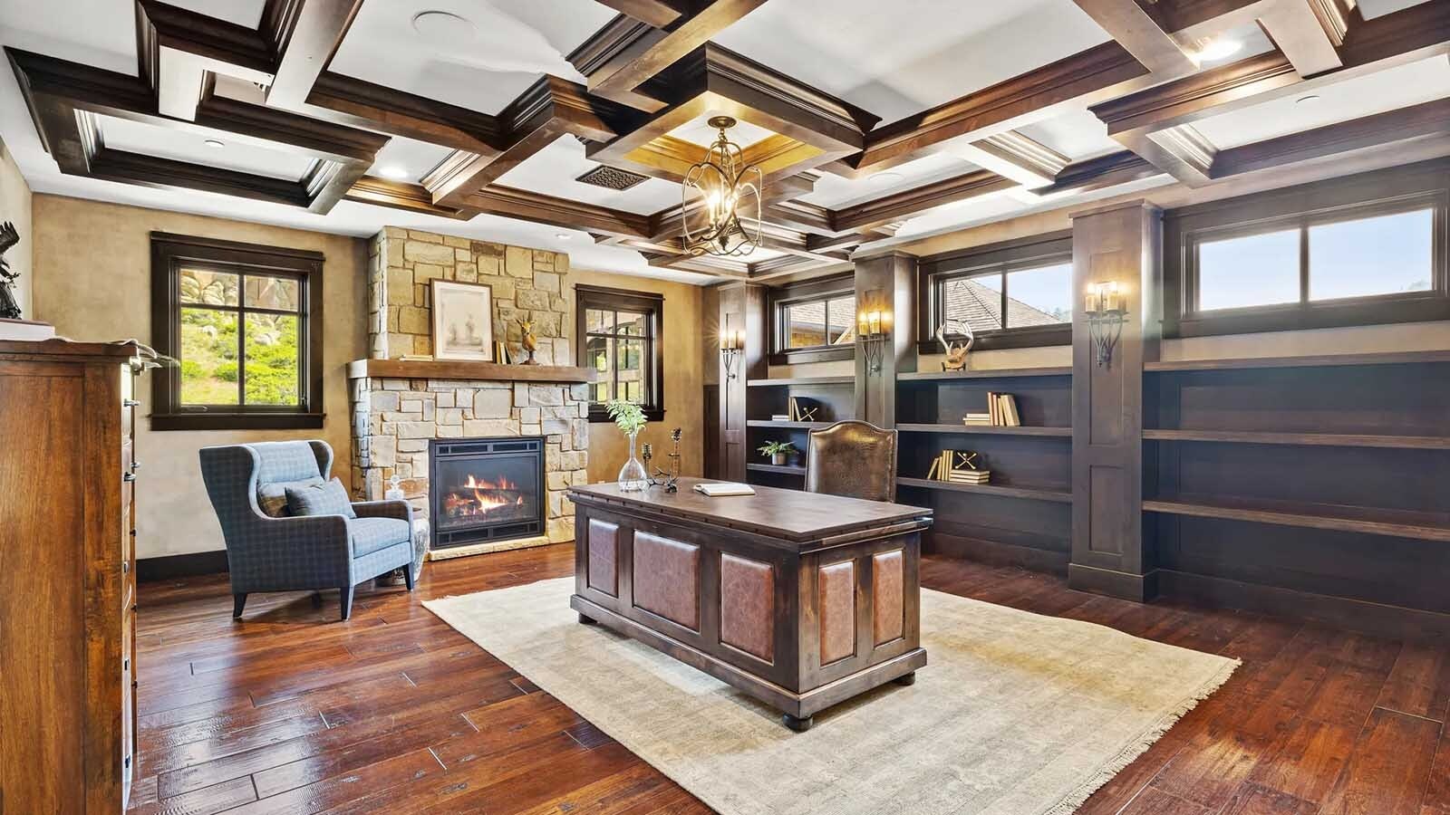 The property at 5650 Canyonwoods Drive in Billings, Montana, is described as a 30,843-square-foot stone chateau with 10 bedrooms and 19 bathrooms, situated on 98 acres. The listing mentions it's priced at $26.9 million and includes amenities like three pools, a 14-car garage, elevators, indoor shooting range, bowling alley, an outdoor 3-hole golf course and an indoor golf simulator, plus a wine cellar, workout gym and theater.