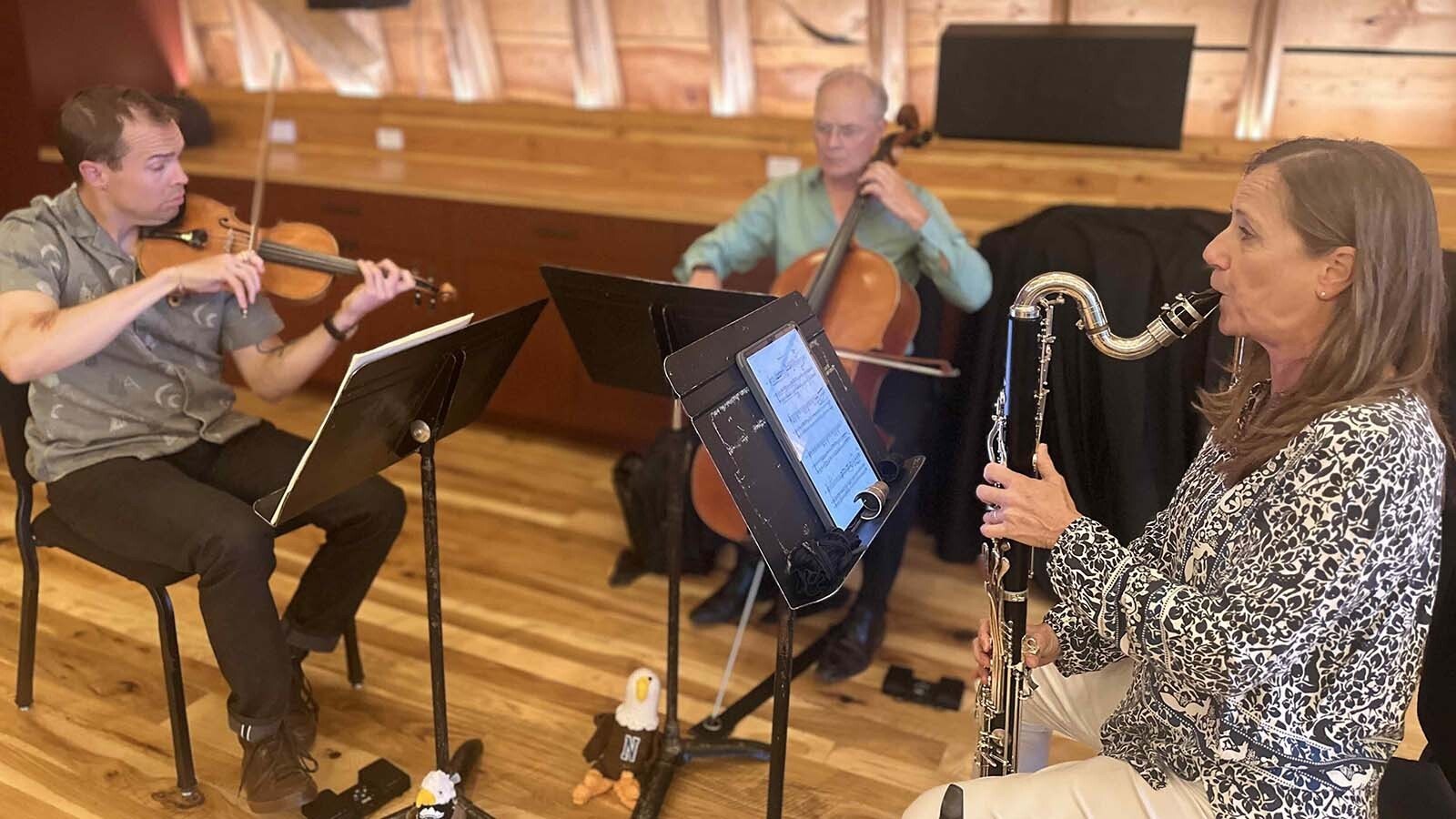 Stephanie Key, clarinet, Miika Gregg, violin, David Mollenauer, cello, along with Meaghan Heinrich, the festival’s education curator.