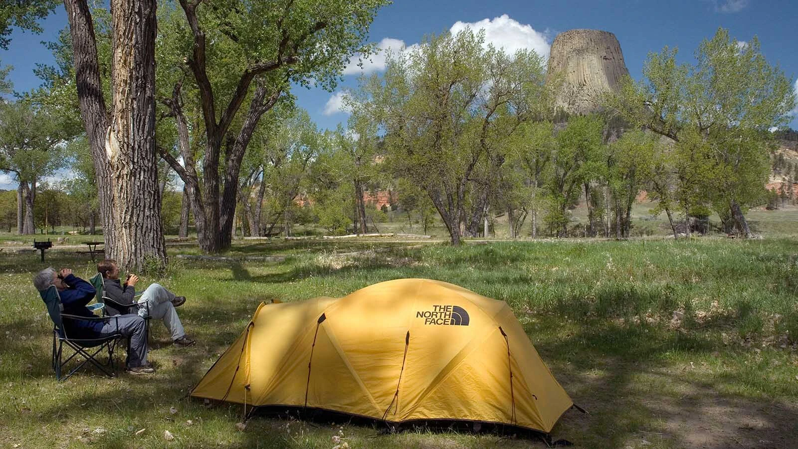 An 83-year-old retired Cheyenne Air Force veteran is crushing sunflower seeds and scattering them across his deck for a small yellow bird that isn’t often seen in Wyoming. A record warm winter has sparked an early start to bird-watching season in Wyoming. Here, a pair of watchers look for birds near Devils Tower.