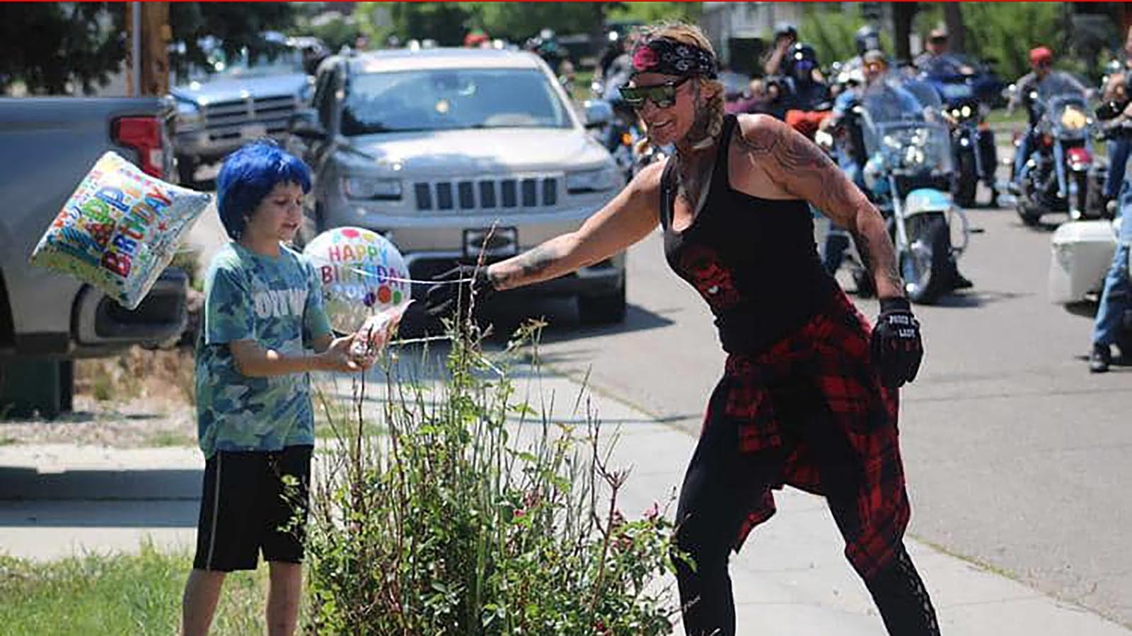 An impromptu call for people to drive by the home of a Rock Springs boy on his 10th birthday rallied more than 100 cars and motorcycles Sunday, July 21, 2024.