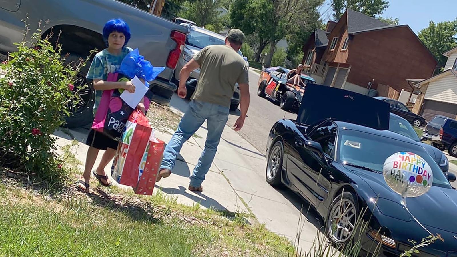 An impromptu call for people to drive by the home of a Rock Springs boy on his 10th birthday rallied more than 100 cars and motorcycles Sunday, July 21, 2024.