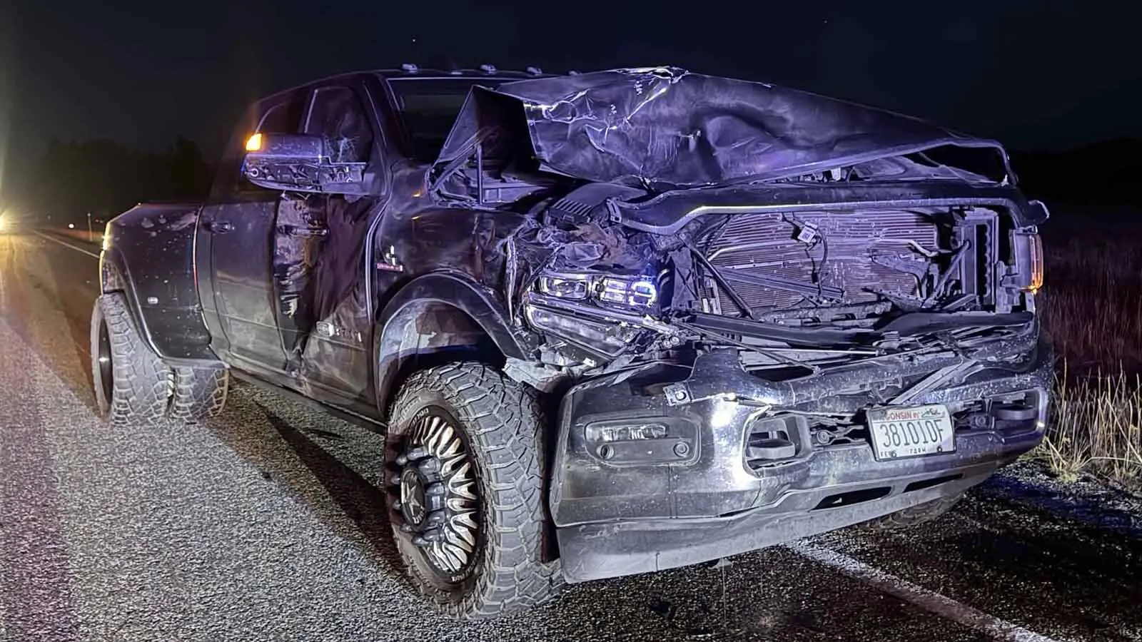 The Dodge Ram pickup truck owned by Jason and Marie Ann Jaskula was totaled Thursday night after hitting a 2,000-pound bull bison in Yellowstone National Park. The bison died from its injuries.