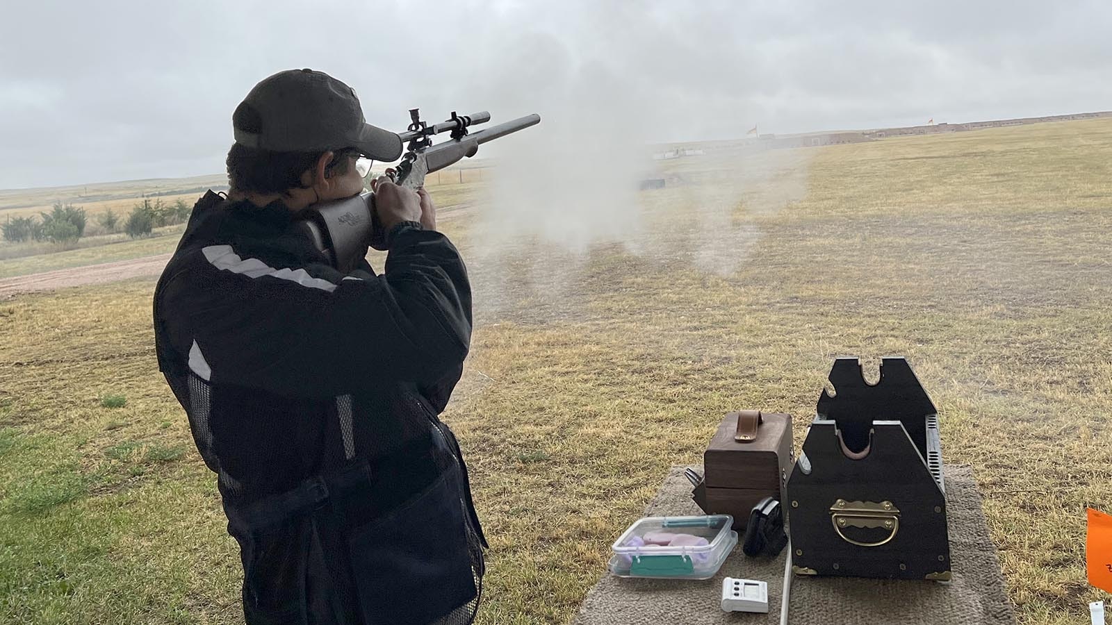 Phillip Dobkins of Cheyenne takes a shot at iron silhouette targets at the Smithmoor BPCR Range near Carpenter on Thursday.