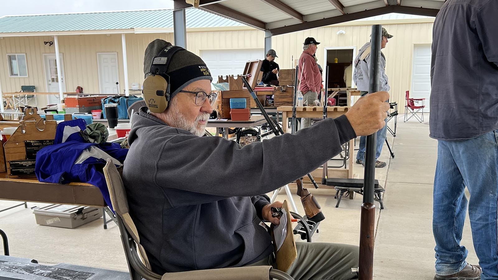 Idaho resident Vaugh Rasmussen waits his turn to shoot in the Smithmoor Cup black powder cartridge rifle shooting match Thursday near Carpenter.