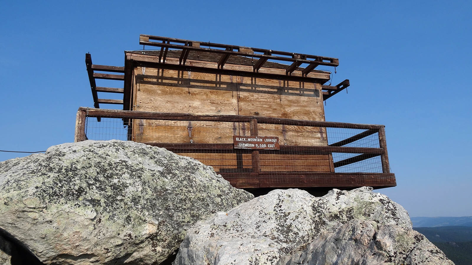 Black Mountain Lookout, at 9,400 feet elevation one of the highest points in the Bighorn Range. The lookout itself has been shuttered for decades, and now the deck also is closed for repairs.