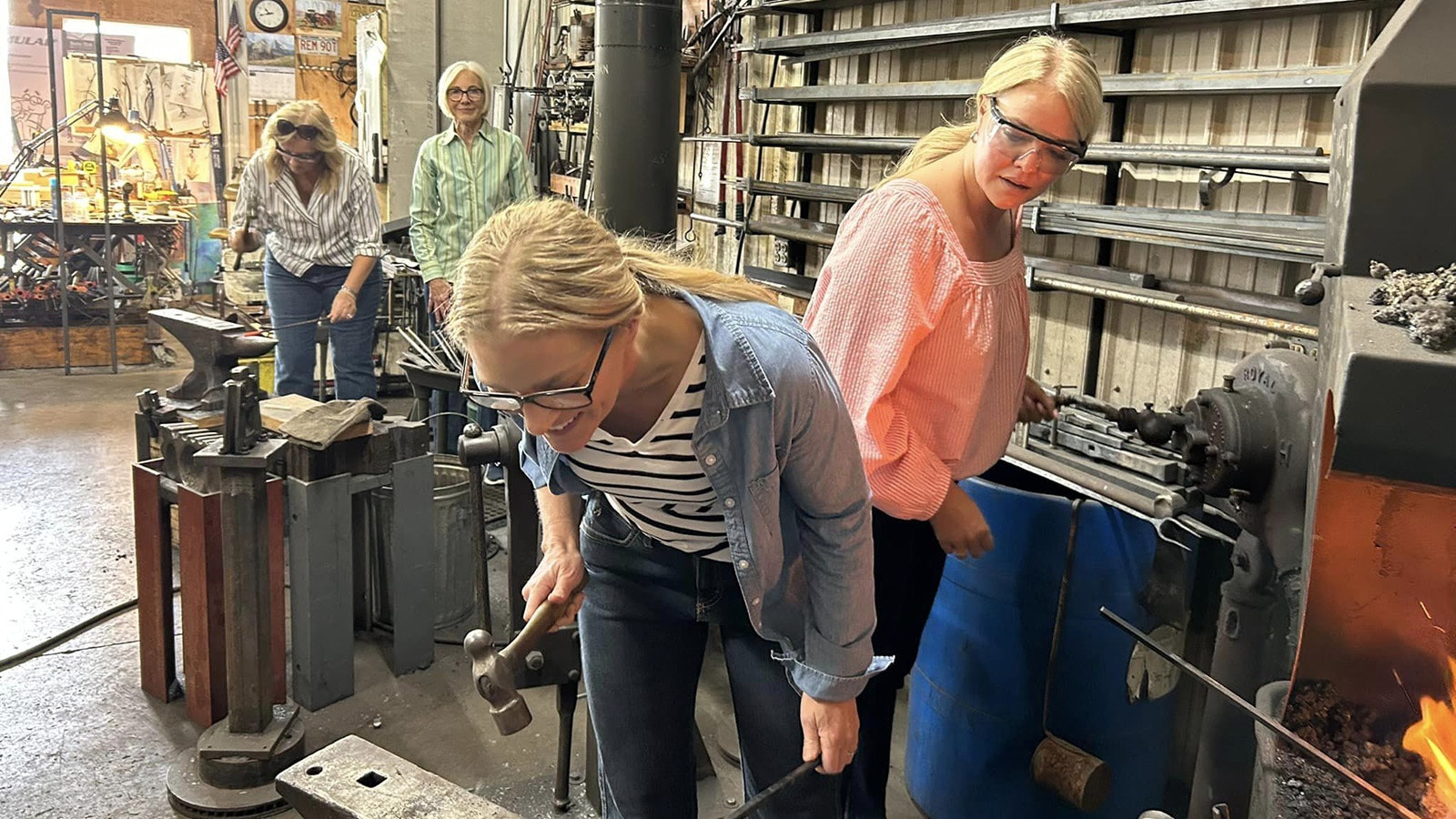 Students taking a one-day class at the Arrowhead Forge.