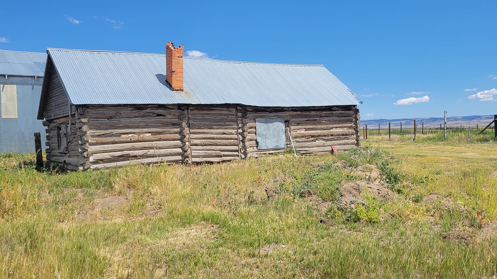 West View of the log blacksmith shop is believed to have been built as early as the 1860s on the Hart Ranch. The Albany County Historical Society is looking into the best way to preserve the structure.