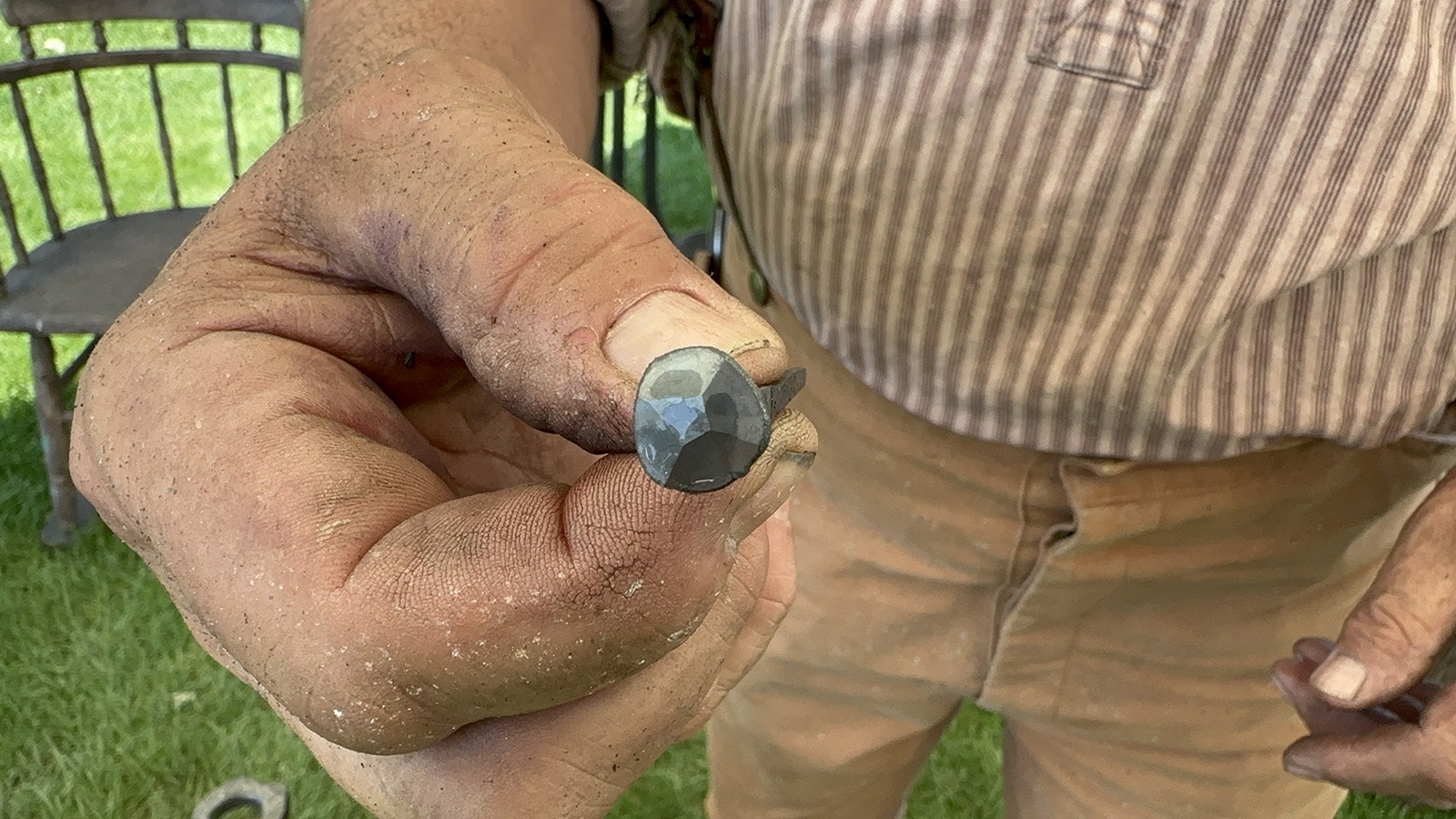 A finished hand-forged nail.