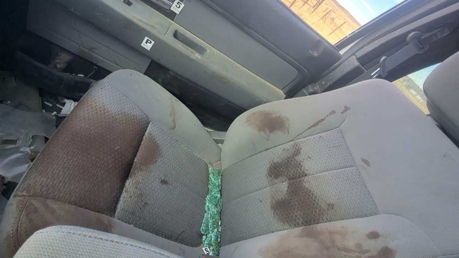 The bloody interior of Marvin and Stephanie Bagley’s truck, after Marvin’s uncle allegedly gunned them both down inside of it near Bairoil last month.