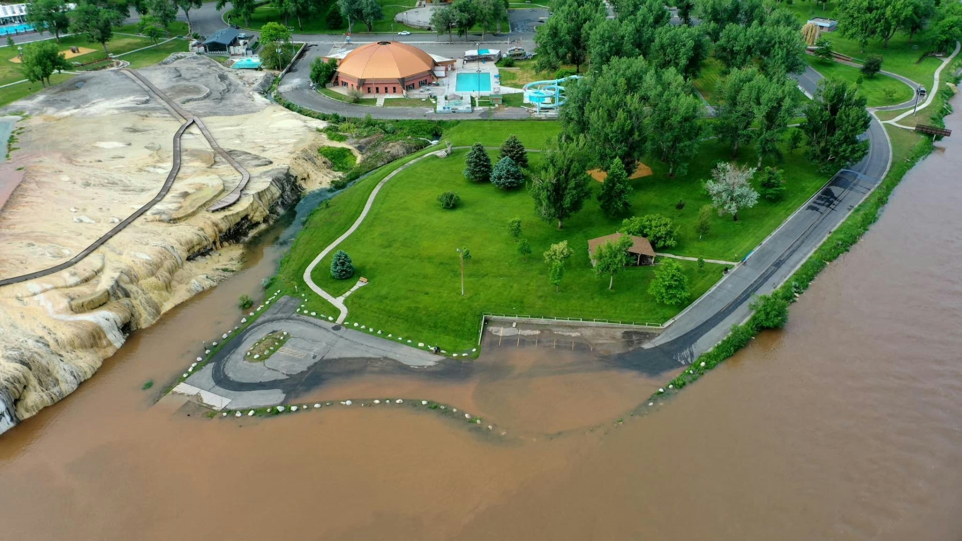 This aerial photo of the Hot Springs Park boat launch shows it under water as the Bighorn River is overflowing.