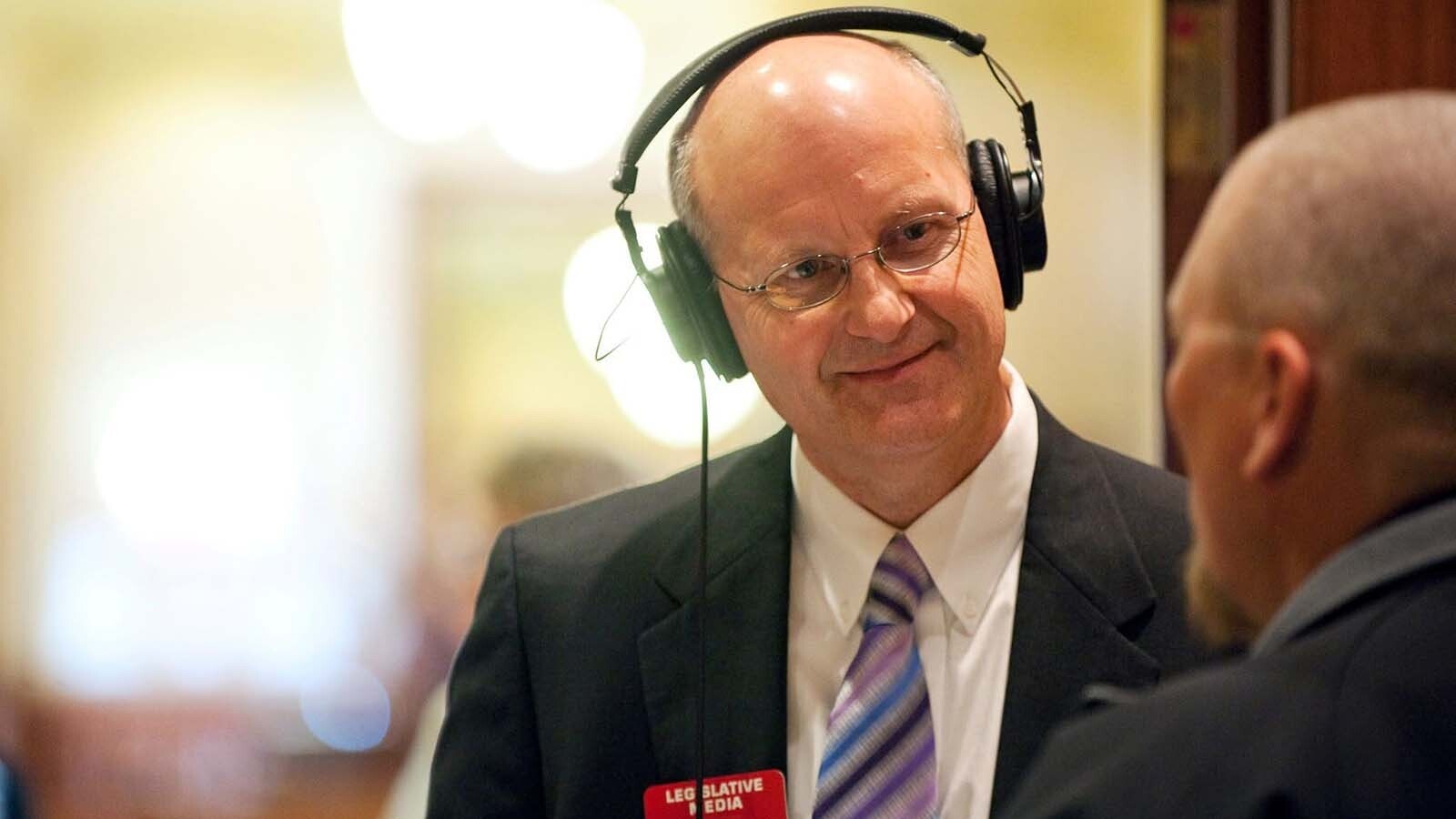 Bob Beck listens while covering the Wyoming legislature. He said he appreciated the “sense of humor” that seemed to be part of the Capitol corridors in his day.