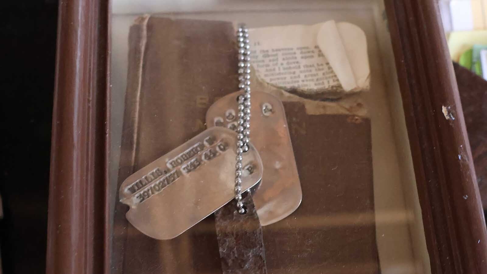 The Book of Mormon and piece of shrapnel that hit the book before entering Bob Willis’ body.