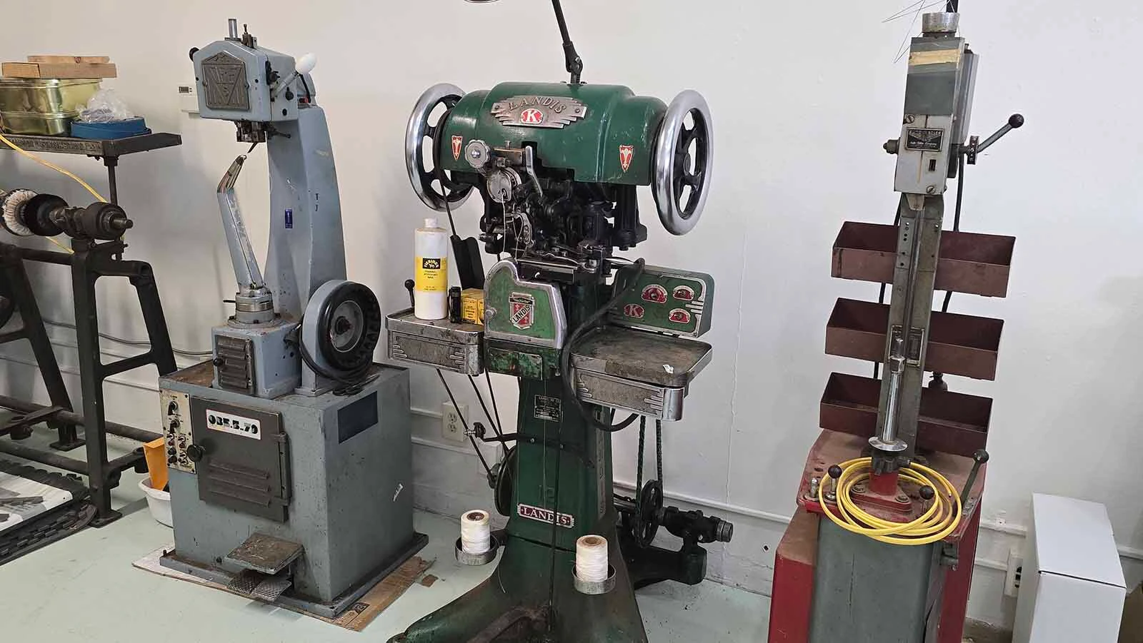 A trio of vintage machines Aly L's new custom bootmaking shop in Cheyenne. The two machines on the left are used often, whiel the third is more of a conversation starter.