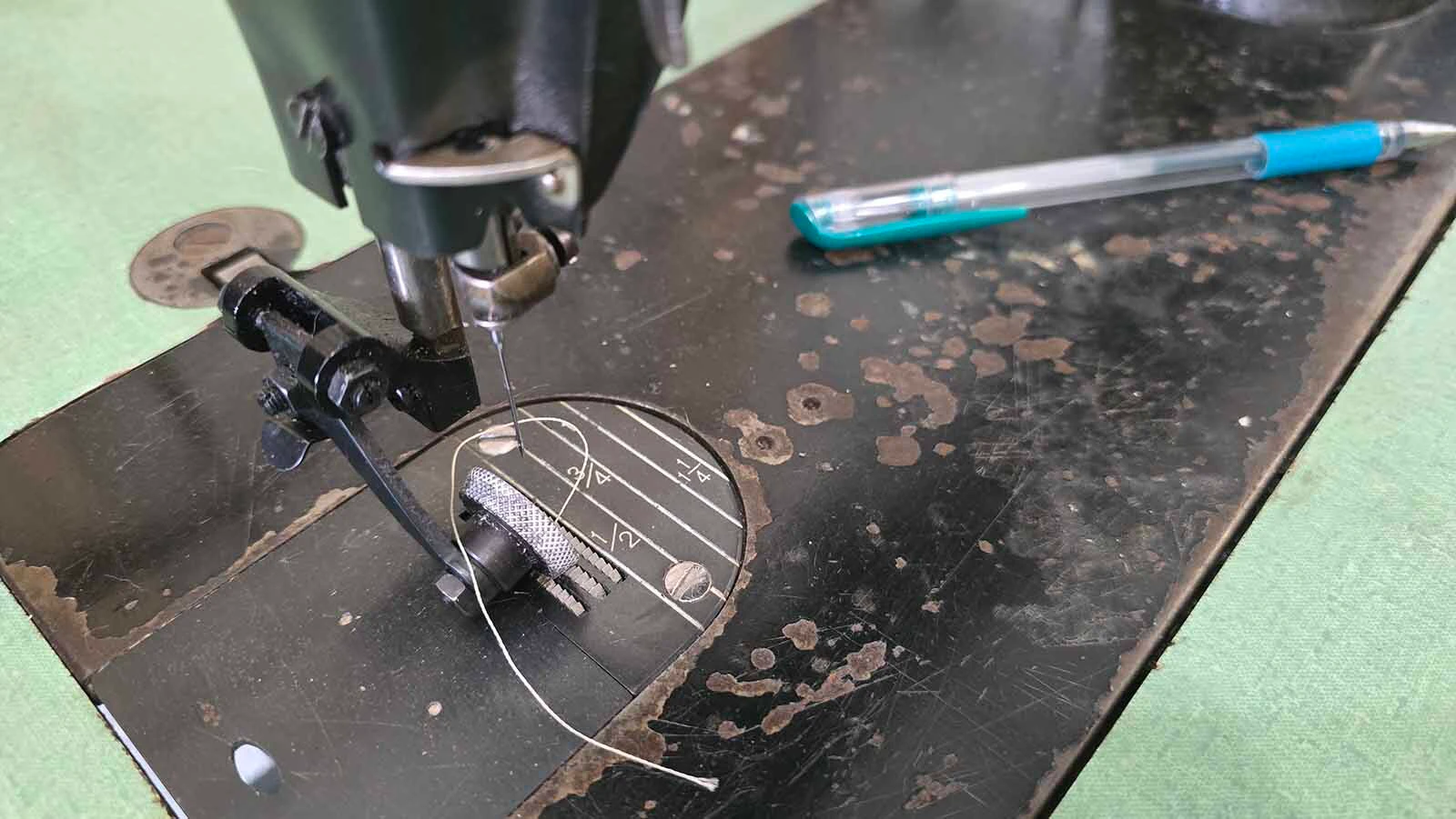 A round roller helps ensure there are no marks on the boots Alyssa Lenell-White is stitching.