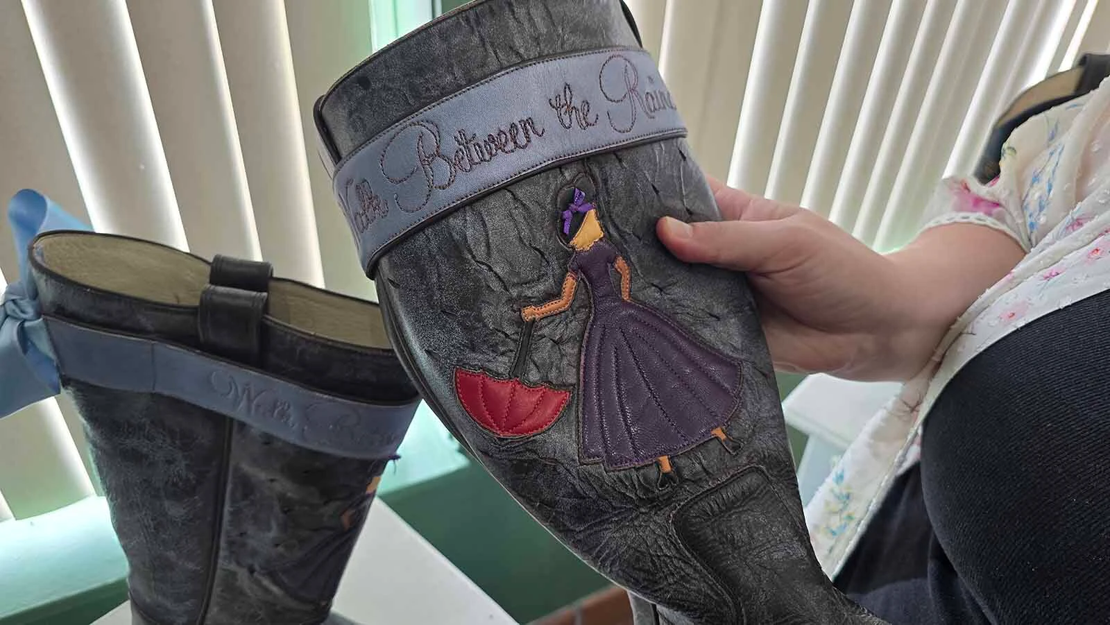 This pair of boots commemorates Alyssa Lenell-White's grandmother and a song she wrote called "Walk Between The Randrops."