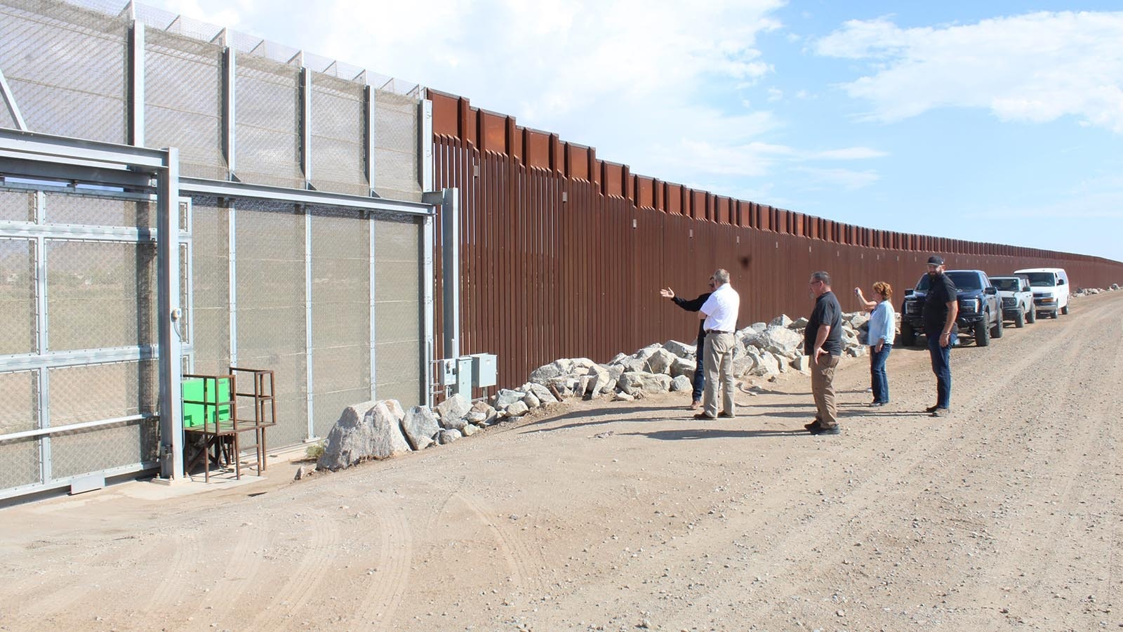 Wyoming lawmakers are shown the difference between the southern border wall built by former President Donald Trump on the right, and a smaller section built by President Joe Biden on the left.