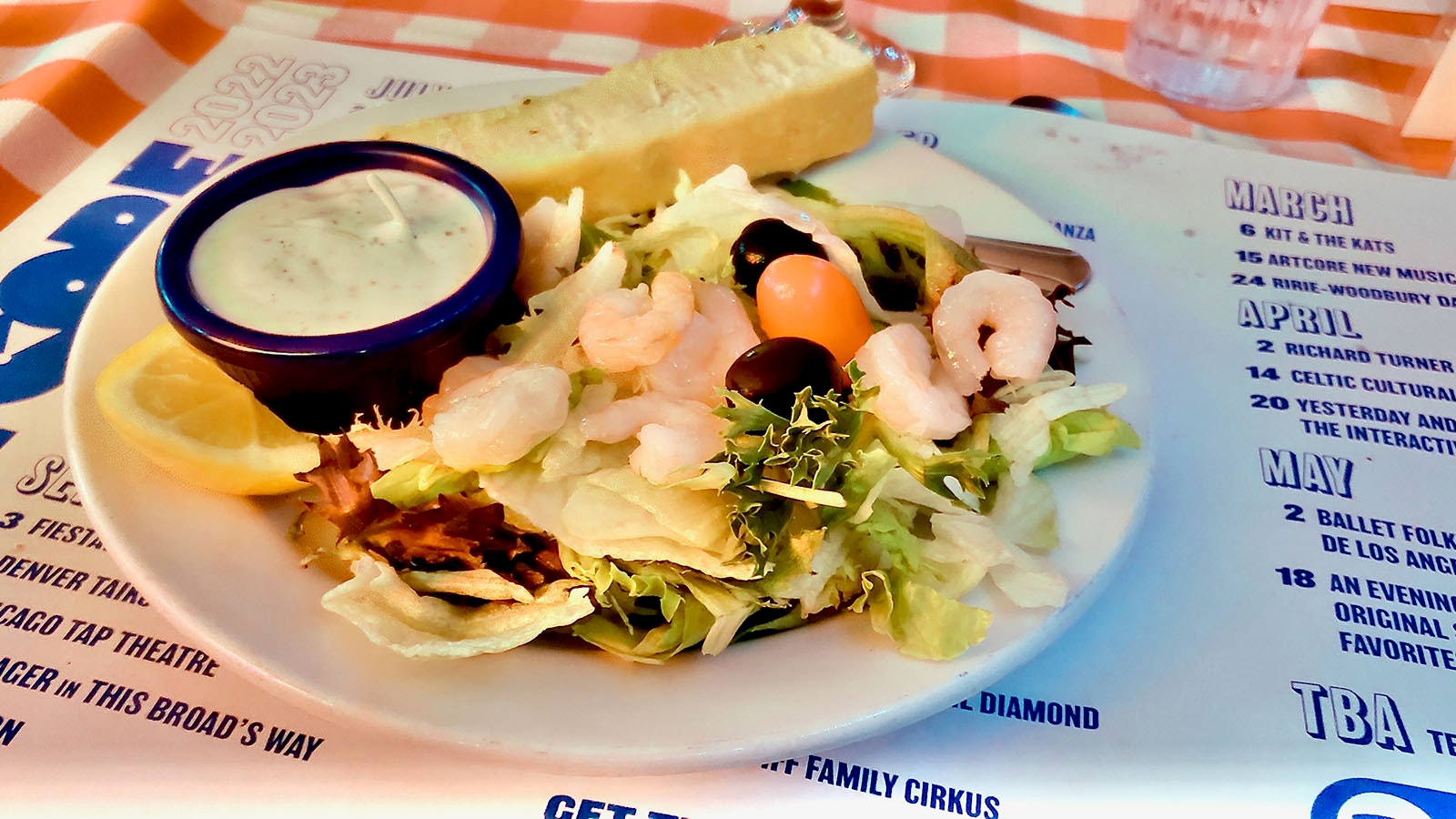 Salads come with shrimp tossed on them for no extra charge.
