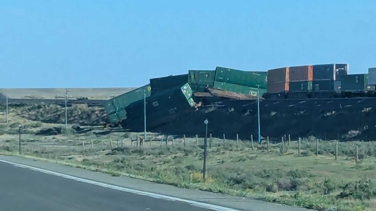 Union Pacific Railroad is investigating what sent 20 railcars off the tracks and caused a small fire near Bolser in Albany County on Wednesday. The derailment also left the tracks littered with packages.