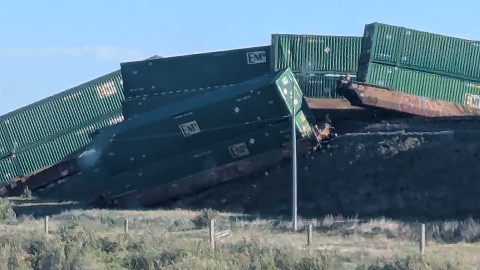 Union Pacific Railroad is investigating what sent 20 railcars off the tracks and caused a small fire near Bolser in Albany County on Wednesday. The derailment also left the tracks littered with packages.