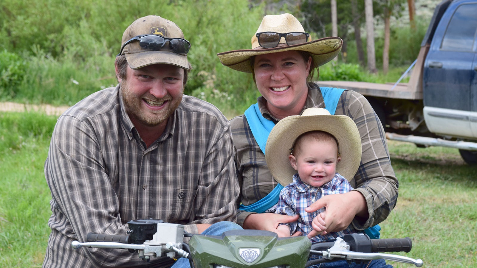 Albany County ranchers Tim and Leisl Carpenter, along with their son Casen, worry that they might not be able to get their cattle up to summer range along Boswell Road, because the road is closed. The couple also recently had a daughter, Kylie.