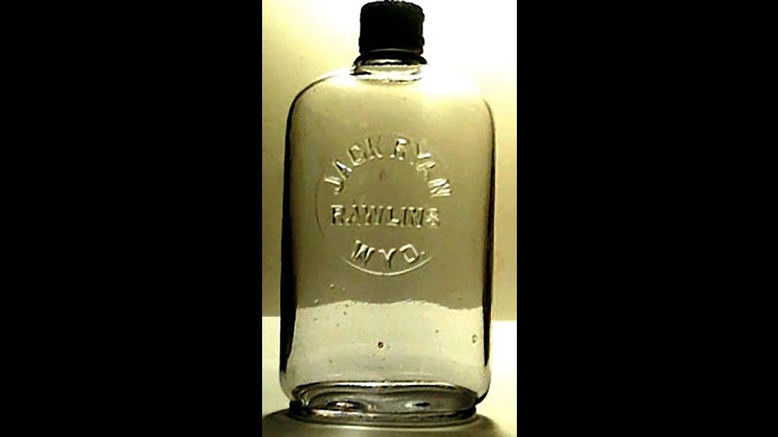 A rare Jack Ryan whiskey flask.