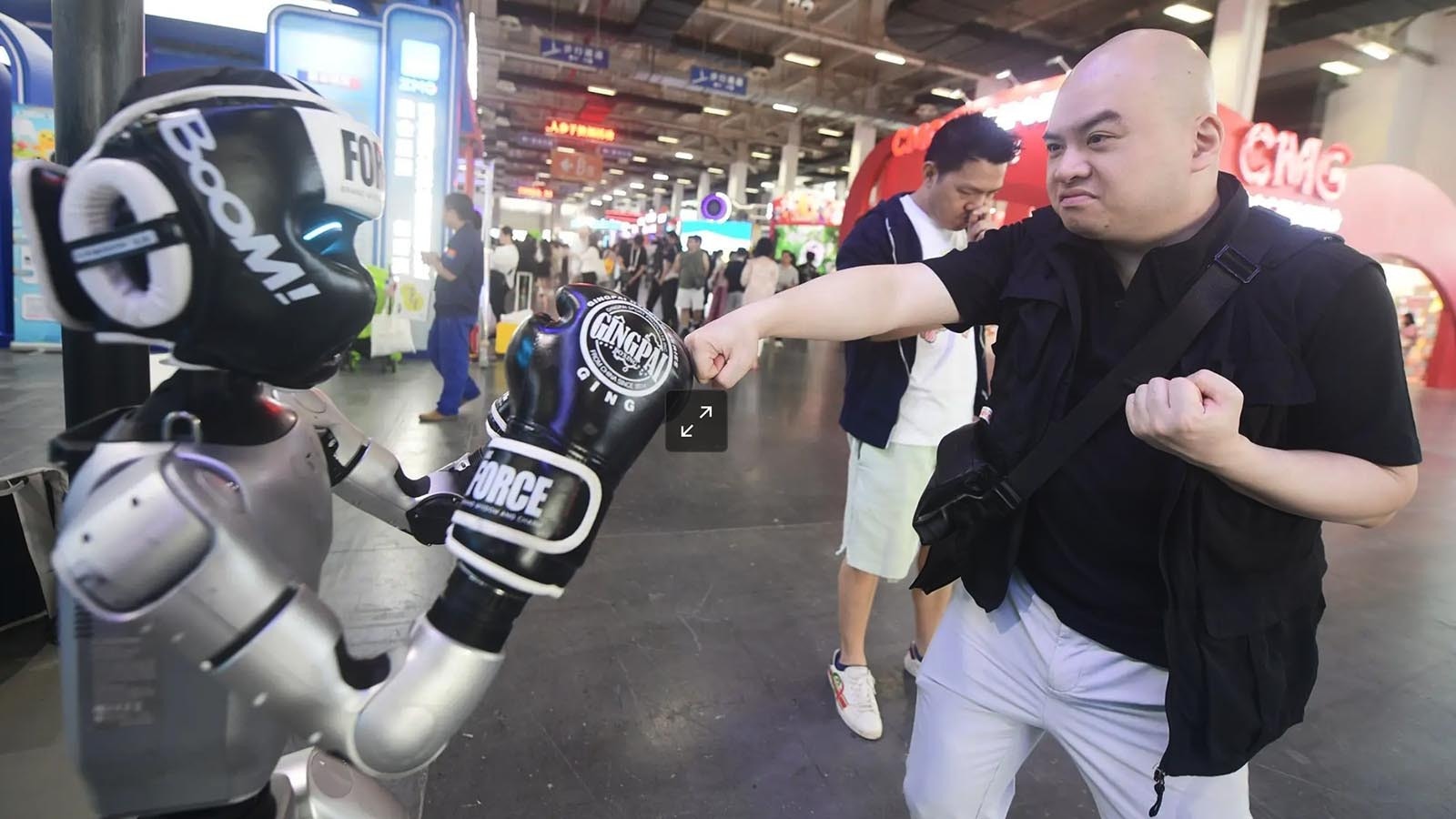 When — not if — humans start competing against robots in combat sports, Wyoming is ready. A Cheyenne man has already outlined what may be the nation’s first rules for “synthetic combat” because “every time we create something, we find a way to fight it." Above, a man tests his boxing skills against UNITREE G1 robot at a convention in China in May 2025.
