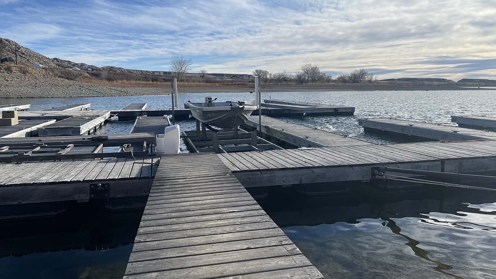 It should be the peak of ice fishing season on Boyson Reservoir in Fremont County, but on Wednesday, it looked more like early fall, with open water all around boat docks at the Boysen Marina.