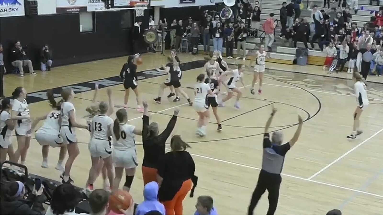 The gymnasium errupts after Sophomore shooting guard Ari Fowler nailed a 3-pointer with 5 seconds left against Riverton on Feb. 20, 2025, to snap Jackson Hole High School’s 79-game, four-year girls’ basketball losing streak.