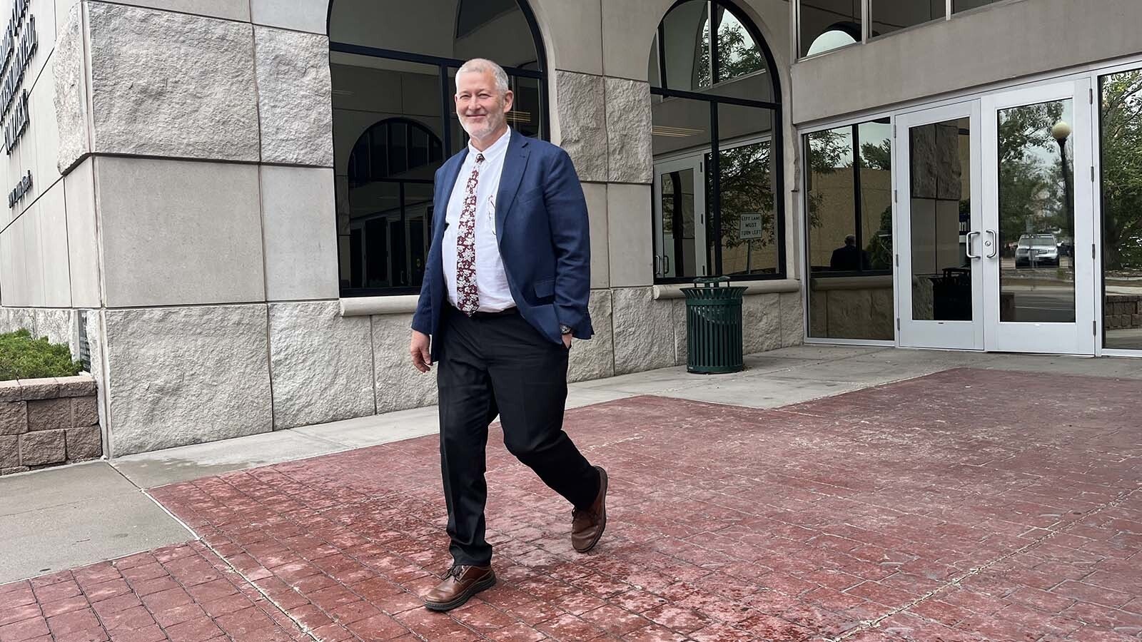 Former Wyoming Superintendent of Public Instruction Brian Schroeder walks out of the Laramie County courthouse and government complex in downtown Cheyenne after a court hearing.