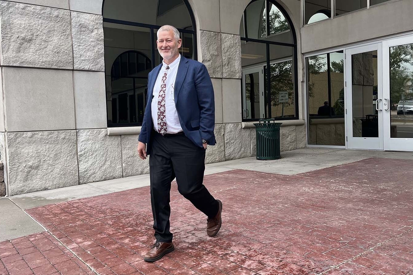 Former Wyoming Superintendent of Public Instruction Brian Schroeder walks out of the Laramie County courthouse and government complex in downtown Cheyenne on Thursday.