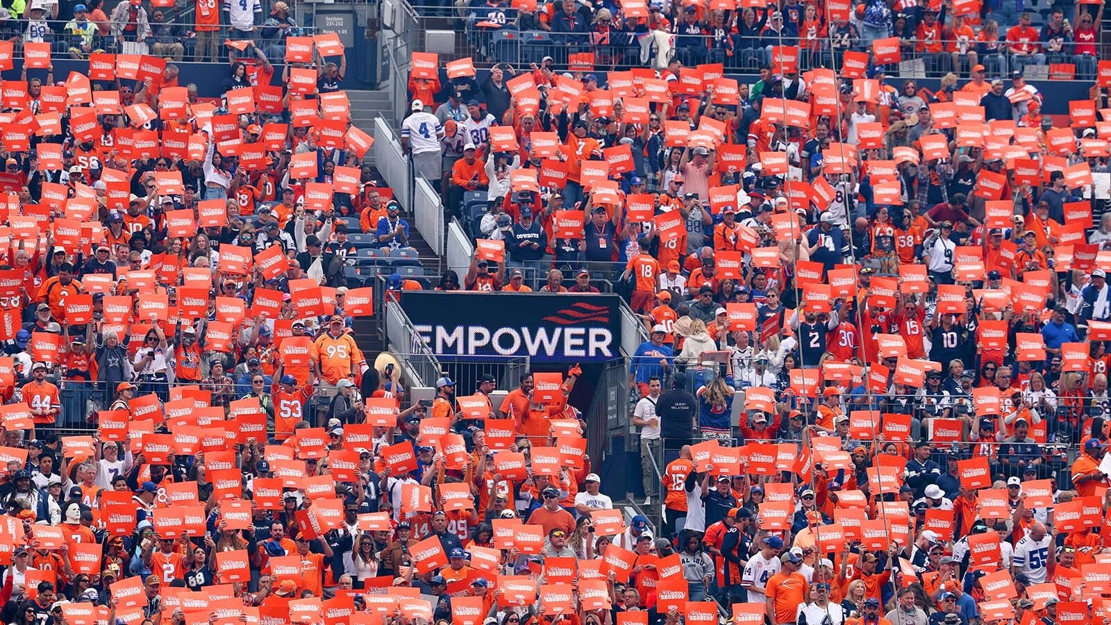 A sea of Denver fans cheer on the Broncos at Empower Field at Mile High.