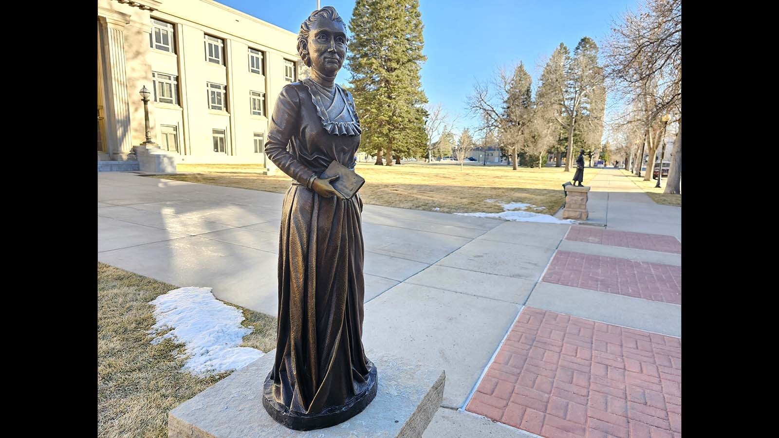 Esther Hobart Morris, Wyoming’s first female justice of the peace, immortalized by sculptor Joel Turner, stands just outside the Wyoming Supreme Court building. Donor was Jim Collins.