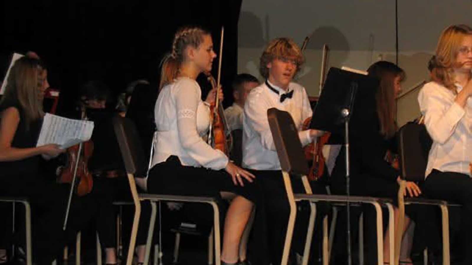 Brooke Latka has been playing the violin since she was seven years old and played in the high school orchestra in Casper. This love of music eventually led to a career as a fiddle player for Chancey Williams and his band.