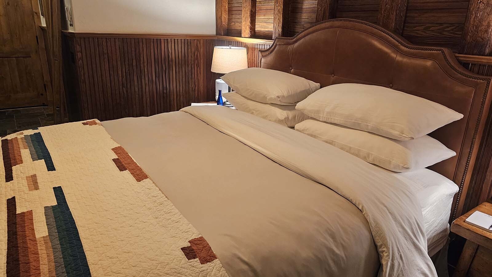 The bed has been made ready, along with the world's fluffiest pillows.