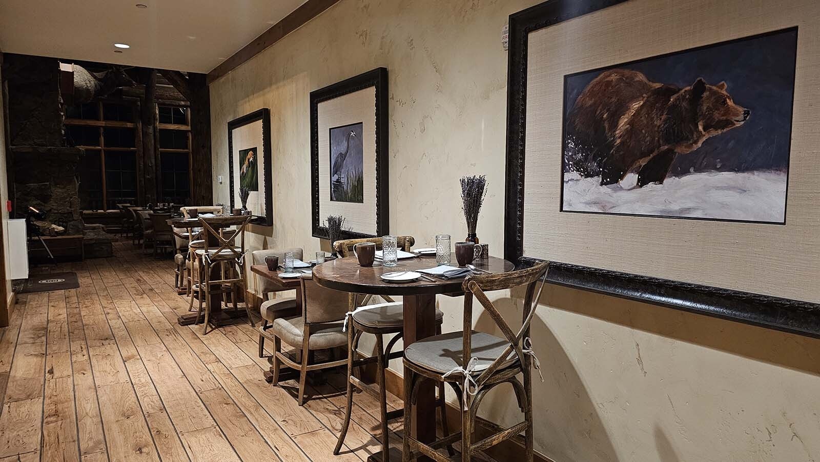 Wildlife art also hangs on the wall at Brush Creek Ranch.