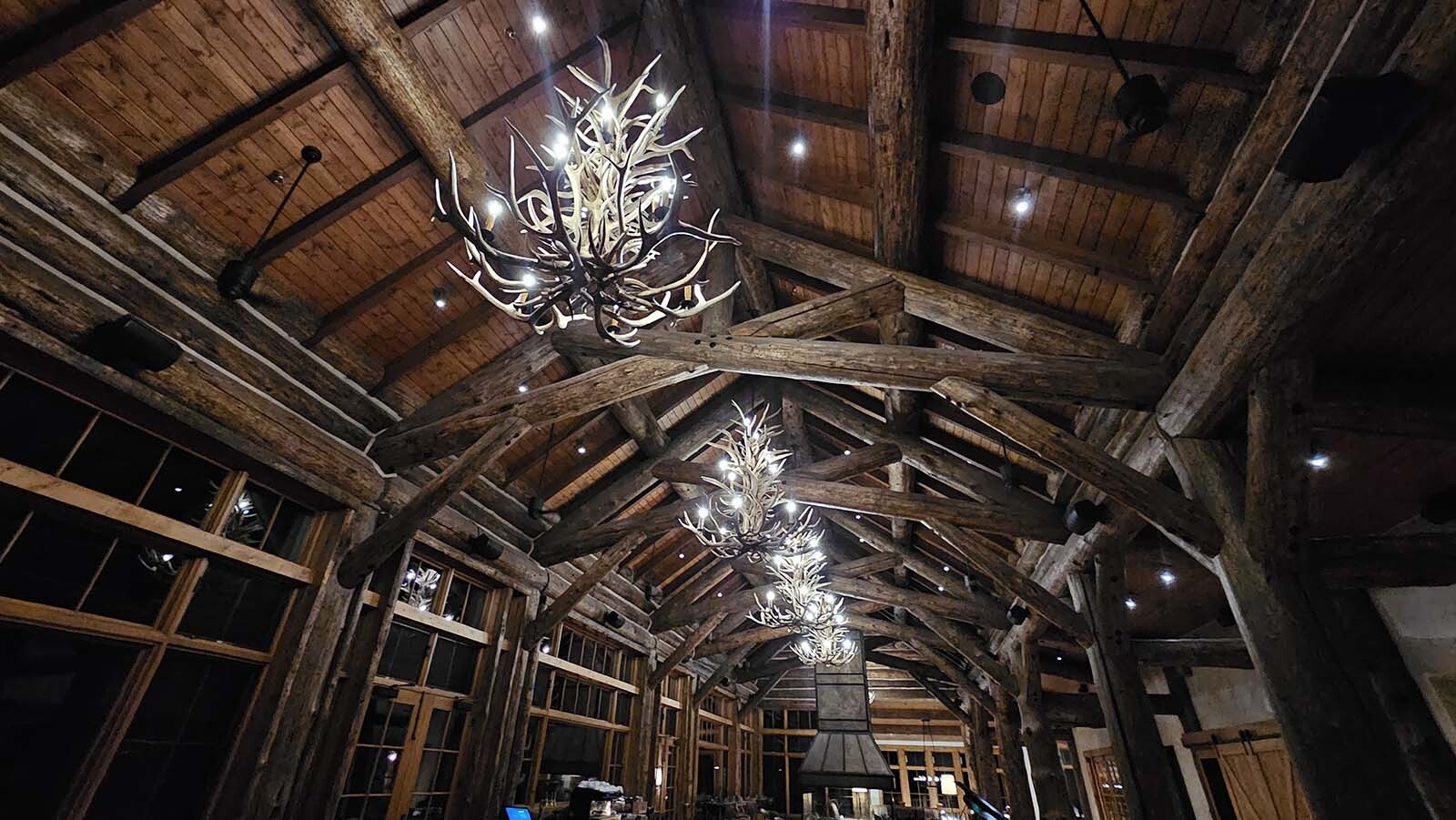 Antler chandeliers complete the fancy-not-fancy look at Brush Creek Ranch.