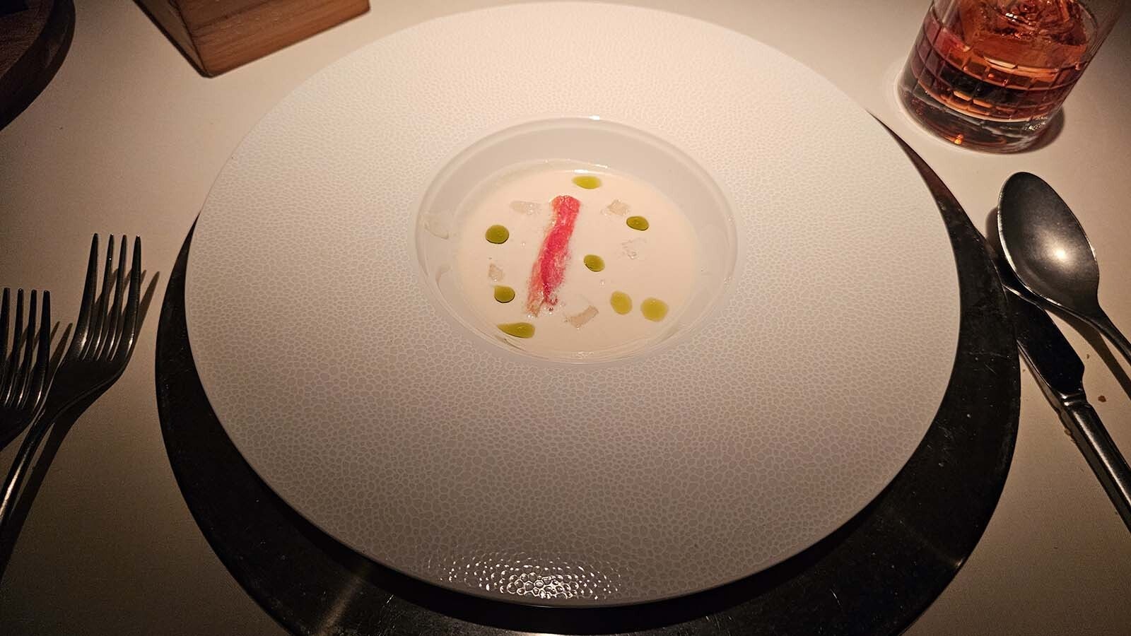 King crab consommé was a delicious starter, a little surf to go with the "turf," a New York strip of wagyu beef.